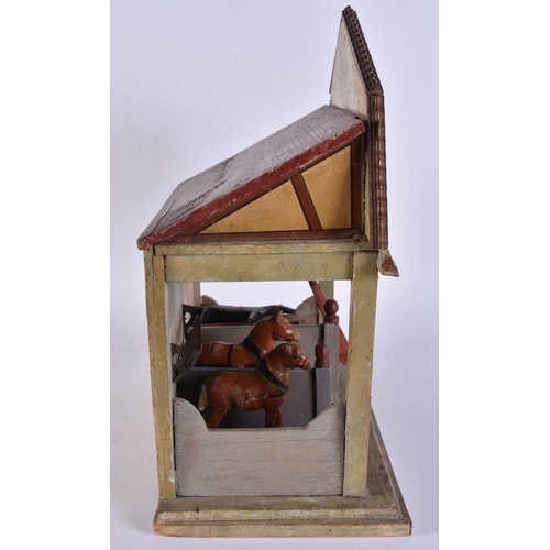 111 - AN UNUSUAL ANTIQUE FOLK ART PAINTED WOOD HORSE STABLES with horses and cart. 40 cm x 25 cm.