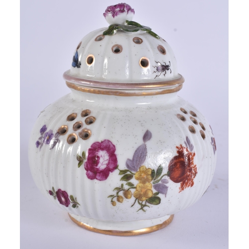 117 - AN 18TH CENTURY GERMAN PORCELAIN POT POURRI AND COVER painted with flowers. 14 cm x 9 cm.