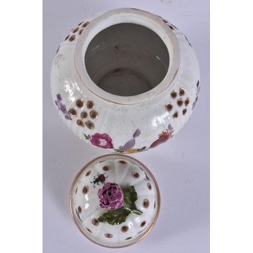 117 - AN 18TH CENTURY GERMAN PORCELAIN POT POURRI AND COVER painted with flowers. 14 cm x 9 cm.