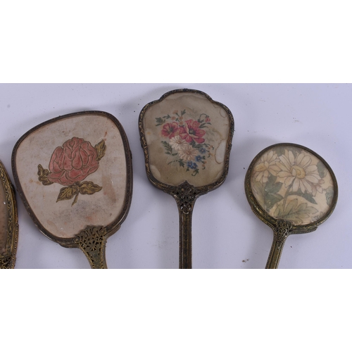 12 - FIVE VINTAGE EMBROIDERED GILT METAL VANITY MIRRORS. 38 cm long. (5)