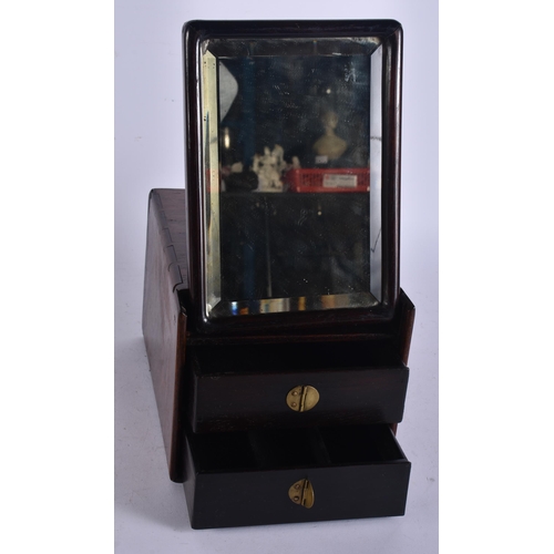 124 - AN 18TH/19TH CENTURY CHINESE CARVED HUANGHUALI WOOD TRAVELLING VANITY CASE with mirror and removable... 