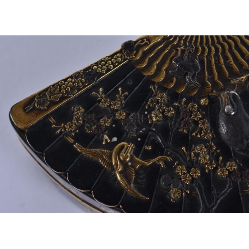 155 - A 19TH CENTURY JAPANESE MEIJI PERIOD BRONZE GOLD ONLAID FAN SHAPED BOX decorated with birds amongst ... 