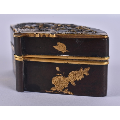 155 - A 19TH CENTURY JAPANESE MEIJI PERIOD BRONZE GOLD ONLAID FAN SHAPED BOX decorated with birds amongst ... 