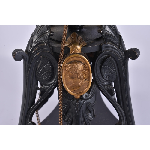 160A - A LARGE PAIR OF 19TH CENTURY FRENCH BRONZE AND GILT BRONZE CANDLESTICKS formed with classical mask h... 