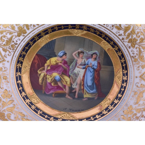 180A - A SUITE OF EARLY 20TH CENTURY AUSTRIAN VIENNA PORCELAIN DESSERT WARES painted with figures in variou... 