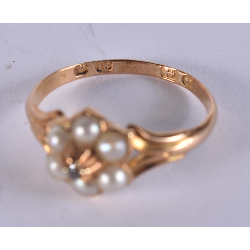 199 - AN 18CT GOLD PEARL AND DIAMOND RING. 2.4 grams.