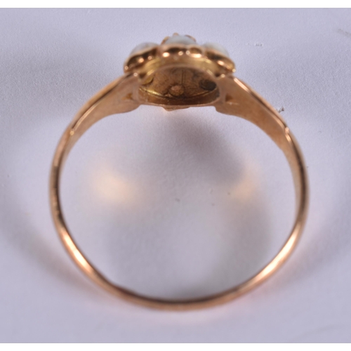 199 - AN 18CT GOLD PEARL AND DIAMOND RING. 2.4 grams.