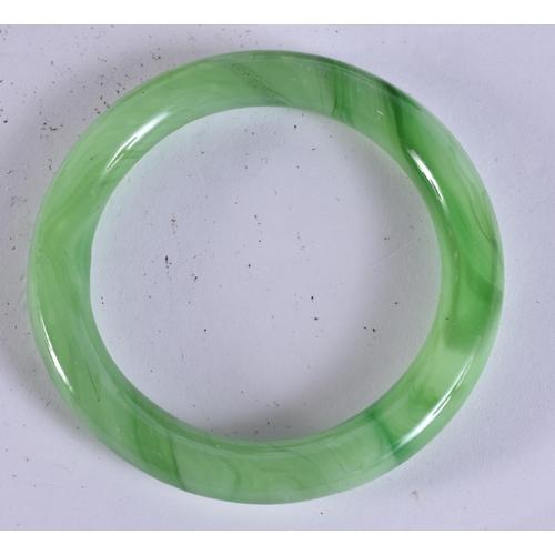 200F - TWO CHINESE YIXING POTTERY TEAPOTS AND COVERS together with a Peking glass bangle. (3)