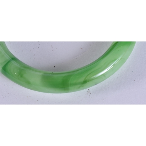 200F - TWO CHINESE YIXING POTTERY TEAPOTS AND COVERS together with a Peking glass bangle. (3)