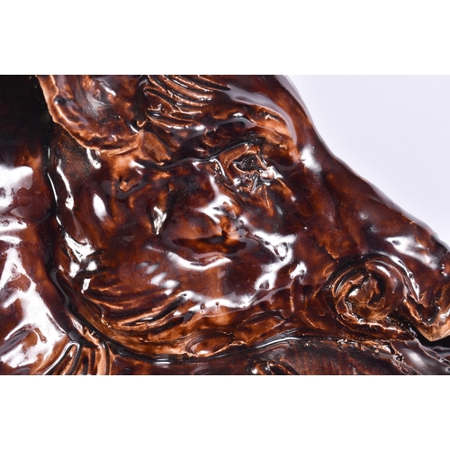 20G - A RARE LARGE 19TH CENTURY CONTINENTAL TREACLE GLAZED GAME TUREEN AND COVER formed with a large wild ... 