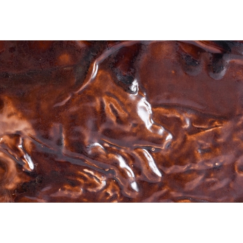 20G - A RARE LARGE 19TH CENTURY CONTINENTAL TREACLE GLAZED GAME TUREEN AND COVER formed with a large wild ... 