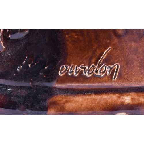 20G - A RARE LARGE 19TH CENTURY CONTINENTAL TREACLE GLAZED GAME TUREEN AND COVER formed with a large wild ... 