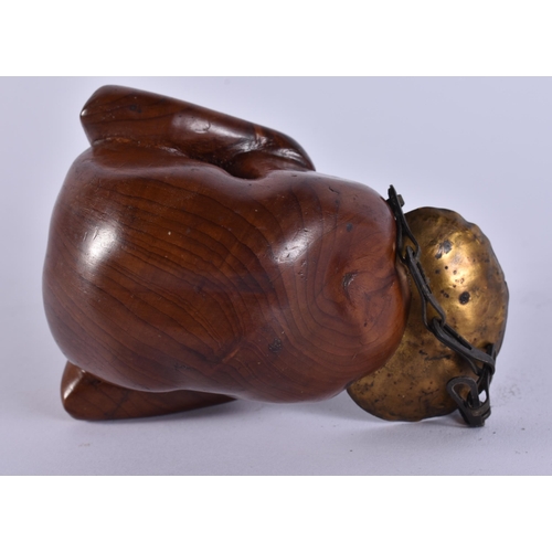 21 - A RARE EARLY 20TH CENTURY EROTIC CARVED WOOD TREEN HANGING OIL BURNER. 15 cm x 8 cm.