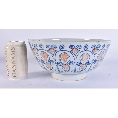 220B - A LARGE 18TH CENTURY DELFT BLUE AND WHITE LIGHT MANGANESE POTTERY BOWL painted with motifs. 25.5 cm ... 