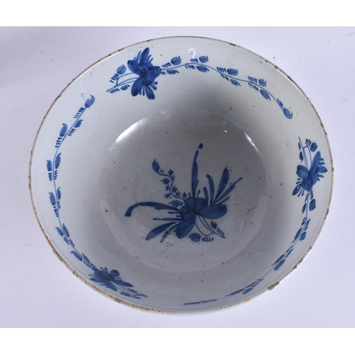 220B - A LARGE 18TH CENTURY DELFT BLUE AND WHITE LIGHT MANGANESE POTTERY BOWL painted with motifs. 25.5 cm ... 