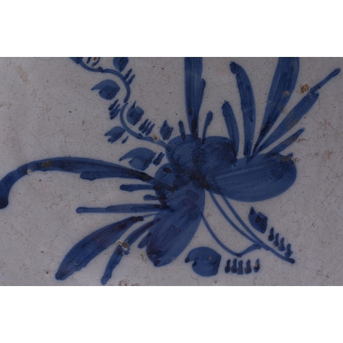 220B - A LARGE 18TH CENTURY DELFT BLUE AND WHITE LIGHT MANGANESE POTTERY BOWL painted with motifs. 25.5 cm ... 