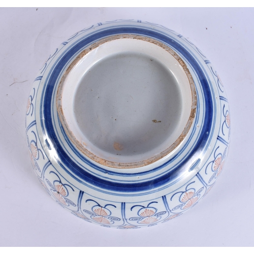 220B - A LARGE 18TH CENTURY DELFT BLUE AND WHITE LIGHT MANGANESE POTTERY BOWL painted with motifs. 25.5 cm ... 