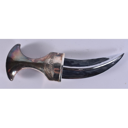 23 - A MIDDLE EASTERN OMANI SILVER CASED JAMBIYA DAGGER. 697 grams overall. 28 cm x 16 cm.