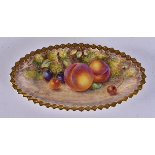230 - A ROYAL WORCESTER FRUIT PAINTED PORCELAIN DISH by Freeman. 17 cm wide.