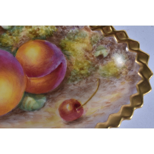 230 - A ROYAL WORCESTER FRUIT PAINTED PORCELAIN DISH by Freeman. 17 cm wide.
