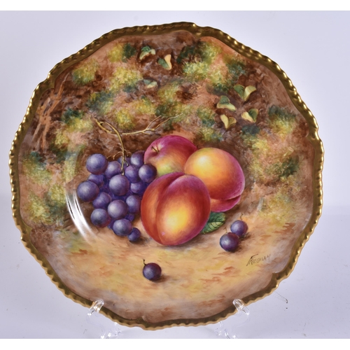 233 - A ROYAL WORCESTER FRUIT PAINTED PORCELAIN PLATE by Freeman. 27 cm wide.