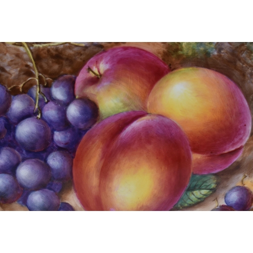233 - A ROYAL WORCESTER FRUIT PAINTED PORCELAIN PLATE by Freeman. 27 cm wide.