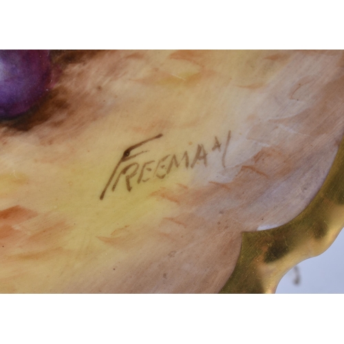 233 - A ROYAL WORCESTER FRUIT PAINTED PORCELAIN PLATE by Freeman. 27 cm wide.