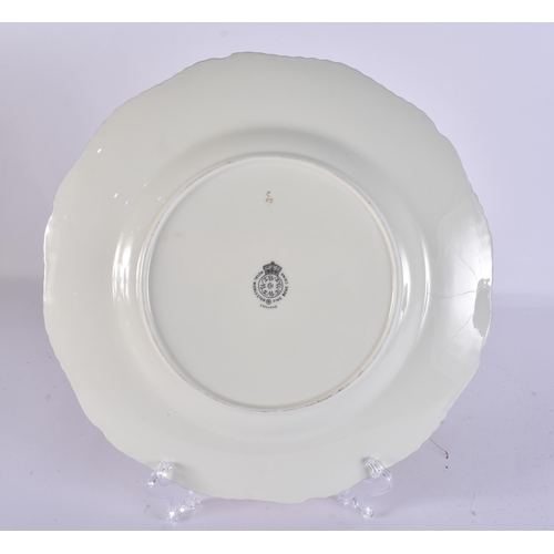 233 - A ROYAL WORCESTER FRUIT PAINTED PORCELAIN PLATE by Freeman. 27 cm wide.