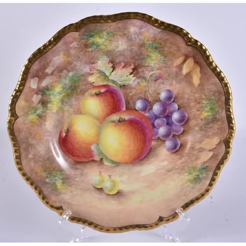 238 - A ROYAL WORCESTER FRUIT PAINTED PORCELAIN PLATE by Johnson. 24 cm wide.