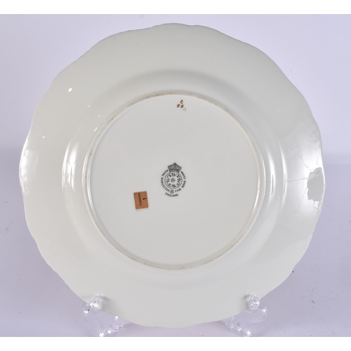 238 - A ROYAL WORCESTER FRUIT PAINTED PORCELAIN PLATE by Johnson. 24 cm wide.