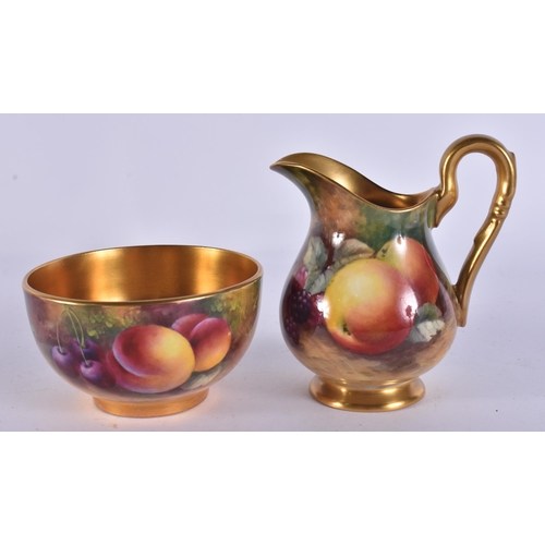 245 - A ROYAL WORCESTER FRUIT PAINTED PORCELAIN JUG together with a similar bowl by Ayrton. (2)