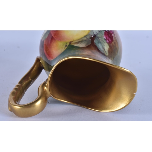 245 - A ROYAL WORCESTER FRUIT PAINTED PORCELAIN JUG together with a similar bowl by Ayrton. (2)