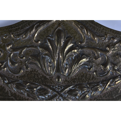 26 - A LARGE ARTS AND CRAFTS BRASS MIRROR overlaid with berries and vines. 86 cm x 68 cm.