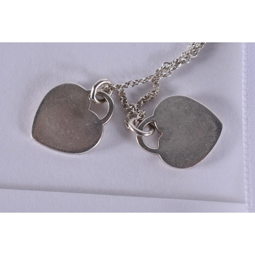 265 - A TIFFANY & CO SILVER NECKLACE together with a pair of tiffany silver earrings. (3)