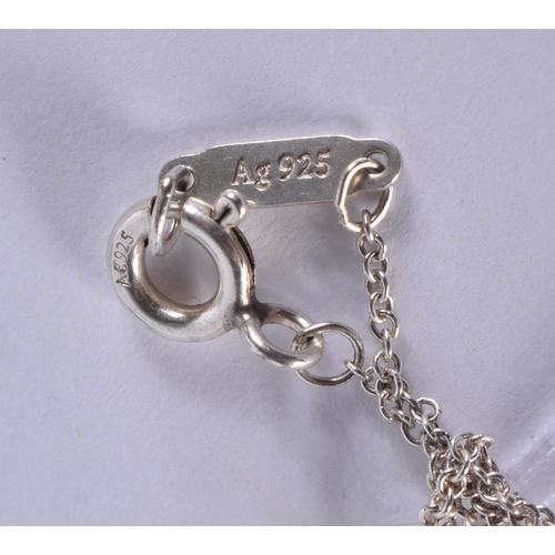 265 - A TIFFANY & CO SILVER NECKLACE together with a pair of tiffany silver earrings. (3)