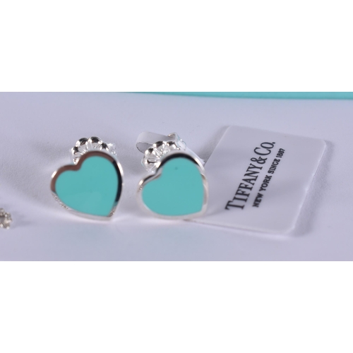 265 - A TIFFANY & CO SILVER NECKLACE together with a pair of tiffany silver earrings. (3)