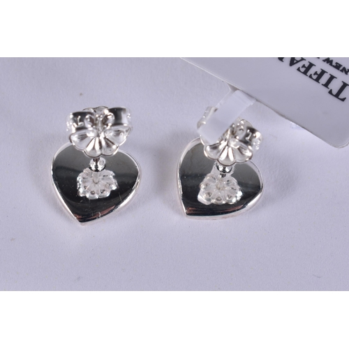 265 - A TIFFANY & CO SILVER NECKLACE together with a pair of tiffany silver earrings. (3)