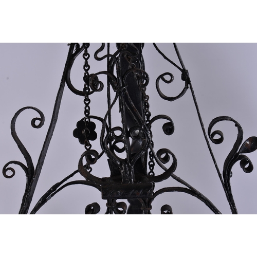 27 - A LARGE AND UNUSUAL PAIR OF ARTS AND CRAFTS FIRESIDE ANDIRONS. 95 cm x 25 cm.