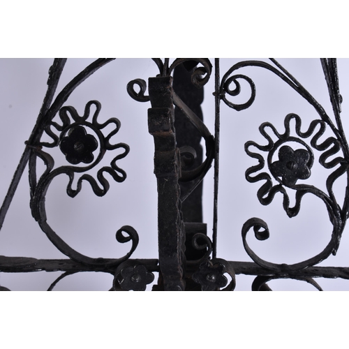 27 - A LARGE AND UNUSUAL PAIR OF ARTS AND CRAFTS FIRESIDE ANDIRONS. 95 cm x 25 cm.