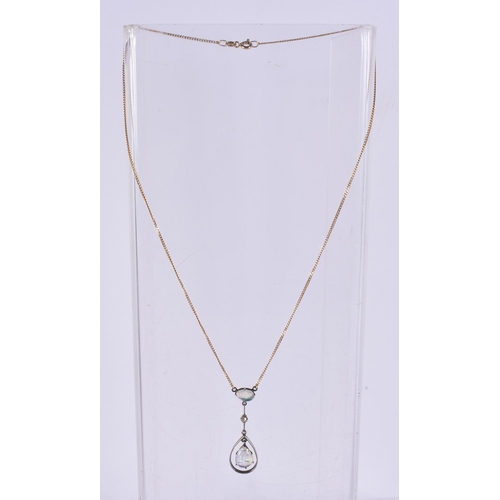 282 - AN EDWARDIAN 9CT GOLD AND OPAL NECKLACE. 3.3 grams. 42 cm long, pendant 3.75 cm x 1.25 cm.