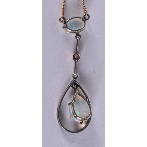 282 - AN EDWARDIAN 9CT GOLD AND OPAL NECKLACE. 3.3 grams. 42 cm long, pendant 3.75 cm x 1.25 cm.