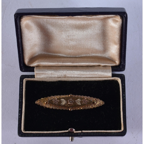 285 - AN ANTIQUE YELLOW METAL BROOCH. 5 grams. 4.5 cm wide.