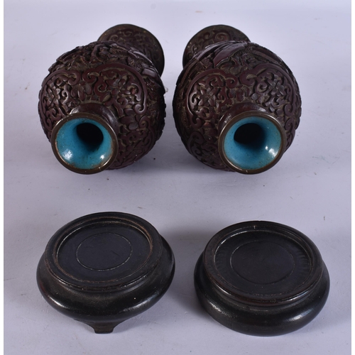 287 - A 19TH CENTURY CHINESE CINNABAR LACQUER DISH together with a pair of vases. (3)