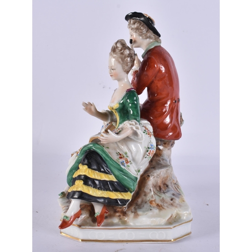 292 - AN ITALIAN NAPLES PORCELAIN FIGURAL GROUP. 18 cm high.