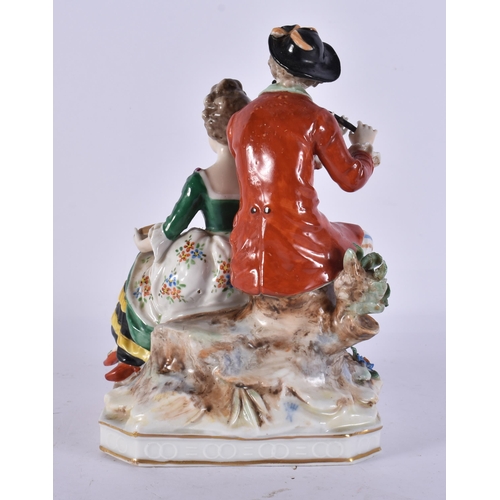 292 - AN ITALIAN NAPLES PORCELAIN FIGURAL GROUP. 18 cm high.