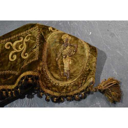 31 - AN EARLY CONTINENTAL EMBROIDERED PELMET TAPESTRY HANGING. 162 cm x 30 cm.