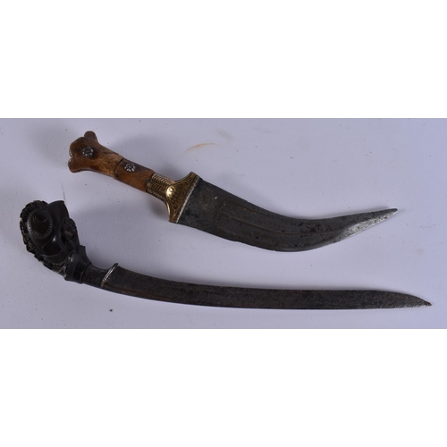 34 - TWO ANTIQUE MIDDLE EASTERN KNIVES etc. Largest 27 cm long. (3) WE ARE UNABLE TO OFFER IN HOUSE SHIPP... 