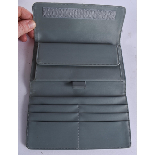 368 - A LOUIS VUITTON PURSE. 10 cm x 18.5 cm.