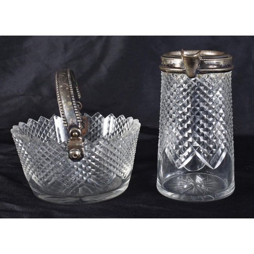 371 - AN ANTIQUE SILVER MOUNTED CUT GLASS BASKET and a matching jug. Largest 9 cm wide. (2)