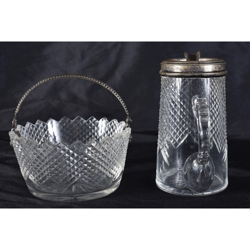 371 - AN ANTIQUE SILVER MOUNTED CUT GLASS BASKET and a matching jug. Largest 9 cm wide. (2)